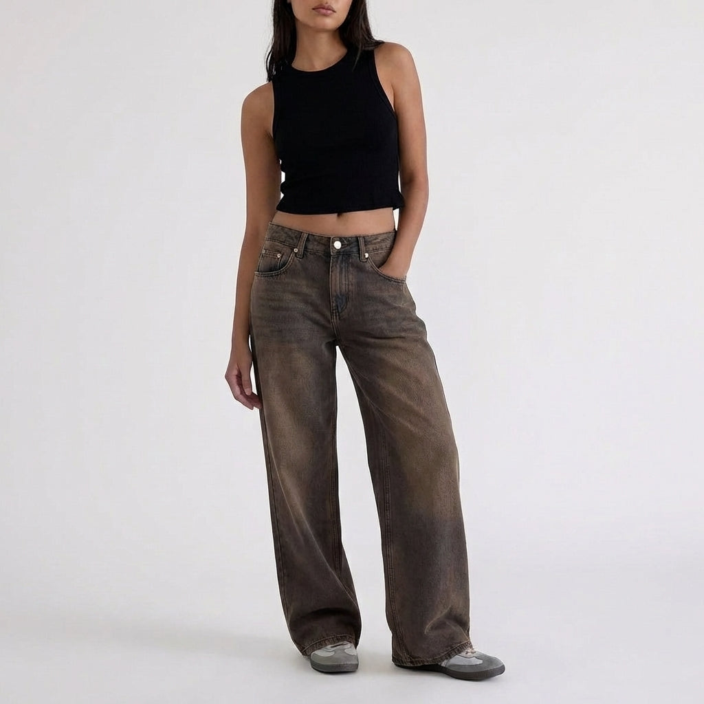 Jeans di denim a vita bassa, gamba larga e vestibilità comoda