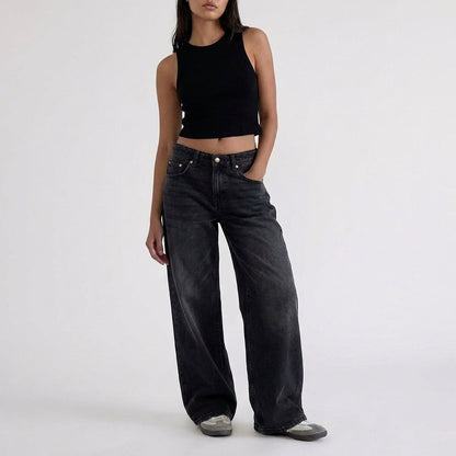Jeans di denim a vita bassa, gamba larga e vestibilità comoda