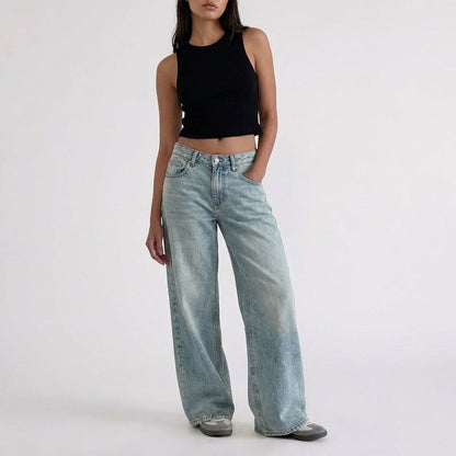 Jeans di denim a vita bassa, gamba larga e vestibilità comoda