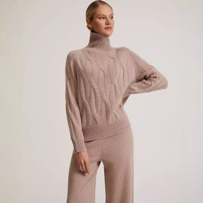 Maglione da donna a collo alto a trecce e pantaloni a gamba larga